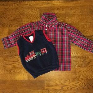 Plaid shirt w/ sweater.